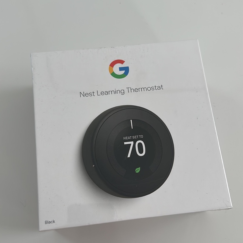 New in box google nest thermostat.